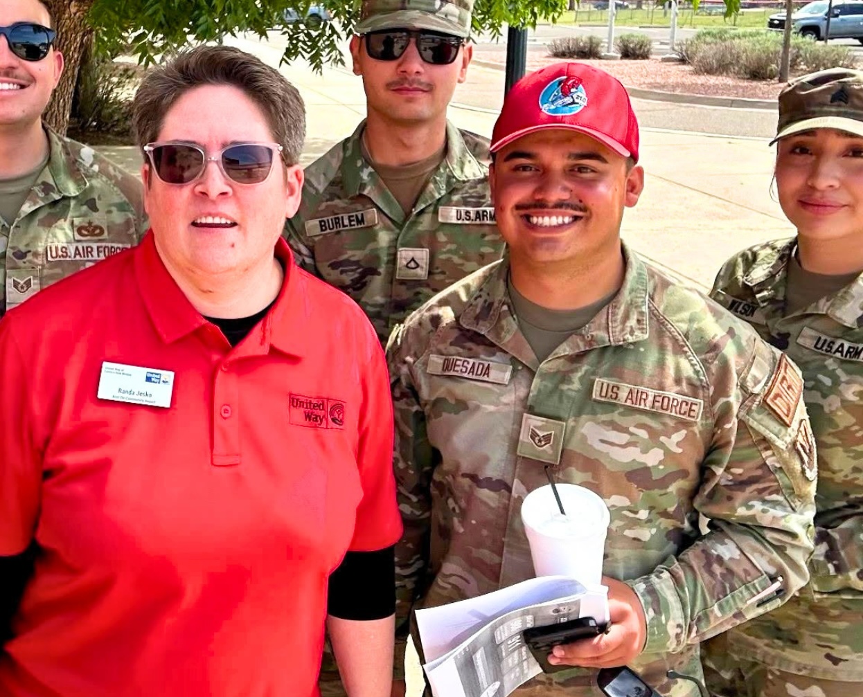 a group of volunteers smile